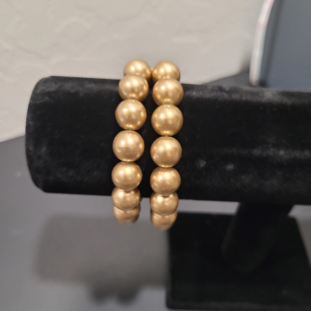 Double strand gold tone bracelet